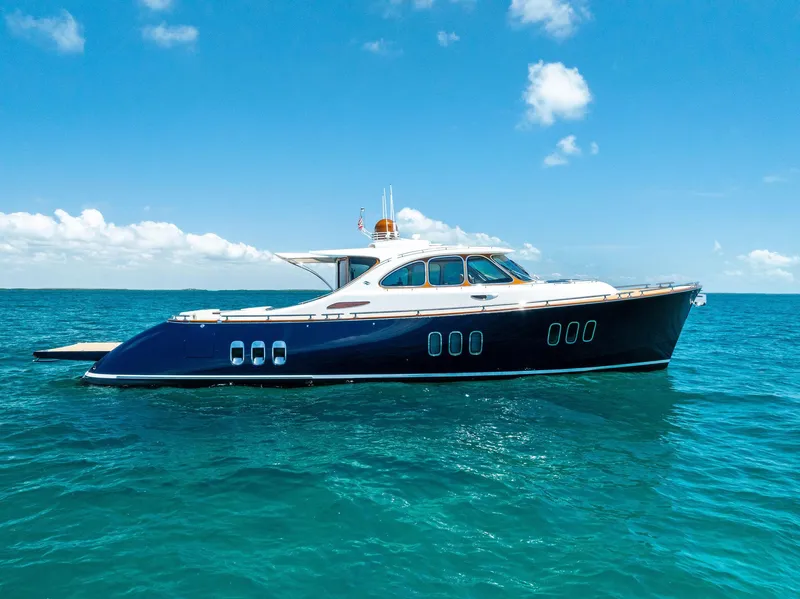 Slide: The Image of 2019 Zeelander 55 yacht cruising on clear blue ocean under a sunny sky. - 8