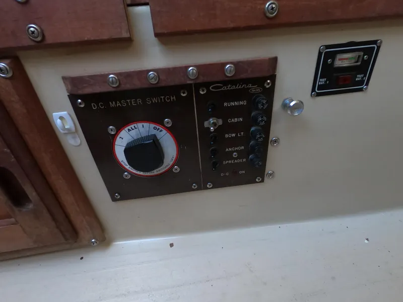 Slide: The Image of Control panel of a 1983 Catalina 27 sailboat with DC master switch. - 8