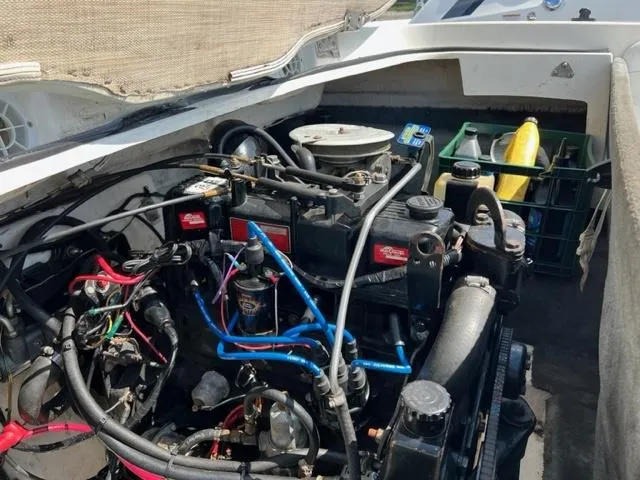 Slide: The Image of Engine compartment of a 2001 Wellcraft 175SS boat, showing detailed wiring and components. - 10