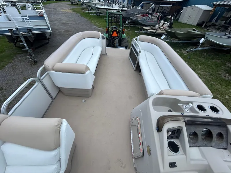 Slide: The Image of 2014 Bennington S22 Saltwater Series pontoon boat with spacious seating and helm. - 15