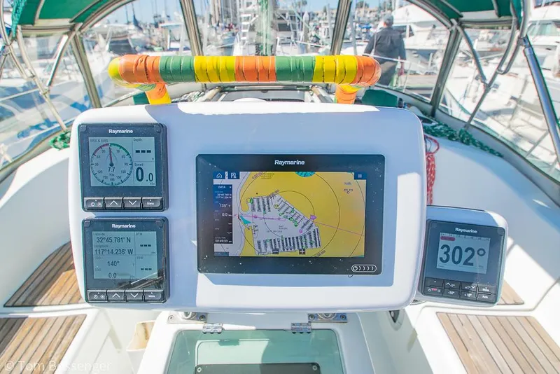 Slide: The Image of Beneteau Oceanis 35.1 cockpit with navigation instruments, 1995 model, featuring Raymarine displays. - 29