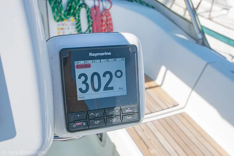 Slide: The Image of Raymarine navigation display on 1995 Beneteau Oceanis 35.1 sailboat, showing 302-degree heading. - 32