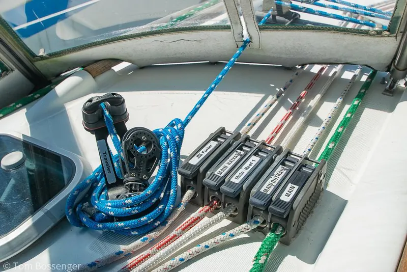 Slide: The Image of Sailing ropes and cleats on a 1995 Beneteau Oceanis 35.1 yacht deck. - 35