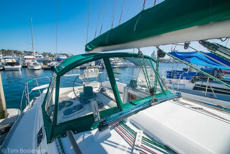 Slide: The Image of Beneteau Oceanis 35.1 sailboat, 1995 model, docked in a sunny marina. - 36