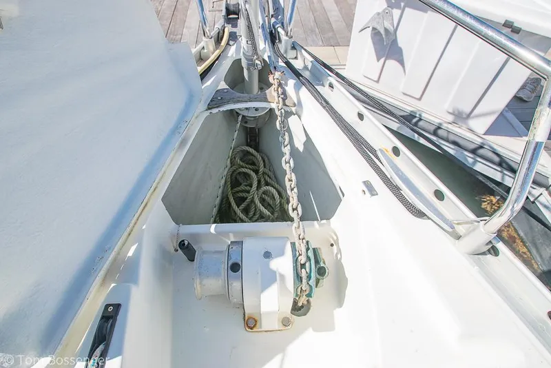 Slide: The Image of Anchor chain and rope storage on 1995 Beneteau Oceanis 35.1 sailboat deck. - 40