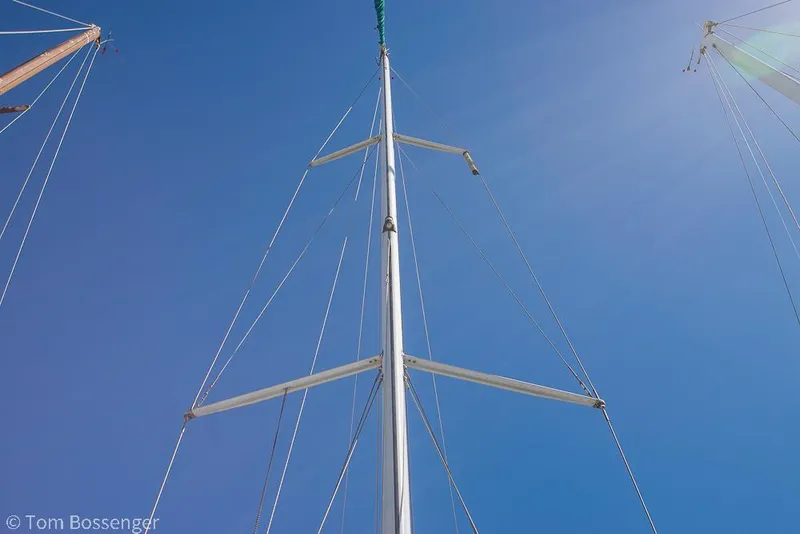 Slide: The Image of Mast of 1995 Beneteau Oceanis 35.1 sailboat against clear blue sky. - 42