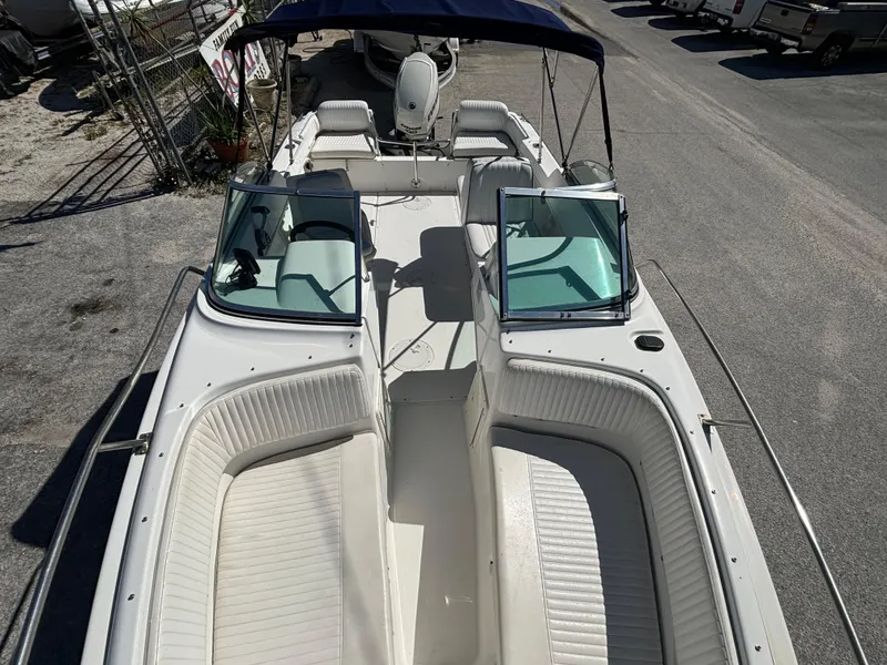 Slide: The Image of 1999 Boston Whaler 20 Ventura Bowrider with spacious seating and dual windshields. - 26
