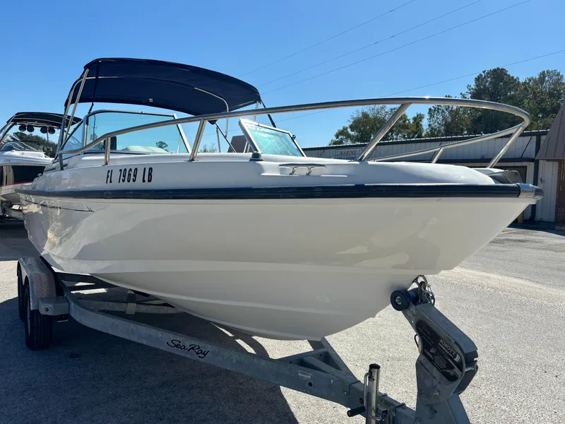 Slide: The Image of 1999 Boston Whaler 20 Ventura Bowrider on trailer, parked outdoors, sunny day. - 3