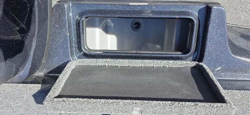 Slide: The Image of 2025 Nitro Z17 storage compartment with open lid, showcasing interior space. - 14