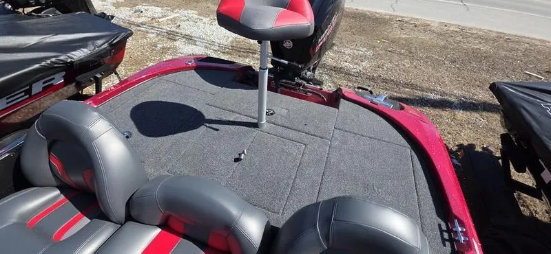 Slide: The Image of 2025 Nitro Z17 boat deck with gray and red seating. - 18