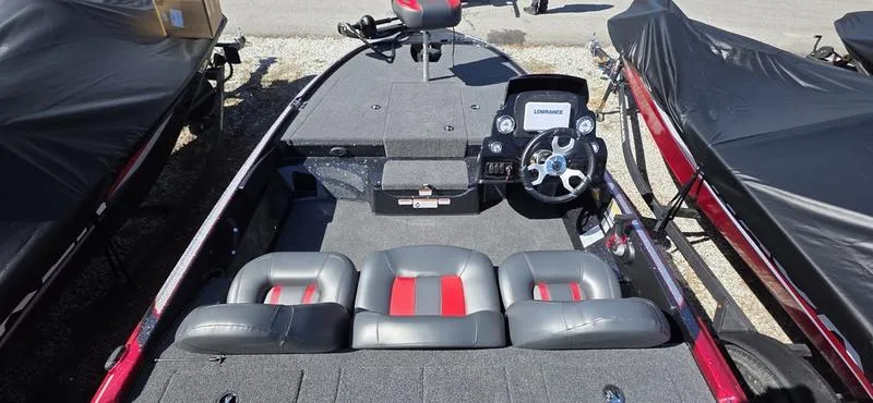 Slide: The Image of 2025 Nitro Z17 boat interior with steering wheel and seating. - 20