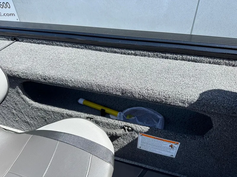 Slide: The Image of Interior storage compartment of 2025 Lund 2075 Pro-V Bass XS boat. - 20