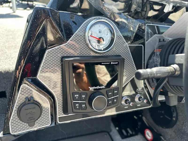 Slide: The Image of Dashboard of 2025 Lund 2075 Pro-V Bass XS boat with control panel and gauge. - 27