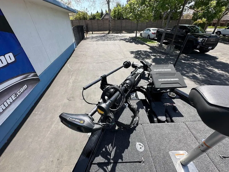 Slide: The Image of 2025 Lund 2075 Pro-V Bass XS boat with advanced fishing equipment on deck. - 37