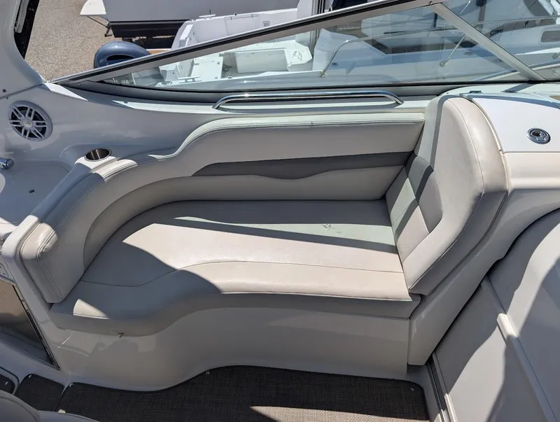 Slide: The Image of 2006 Chaparral 310 Signature boat interior with sleek, cushioned seating and modern design. - 20