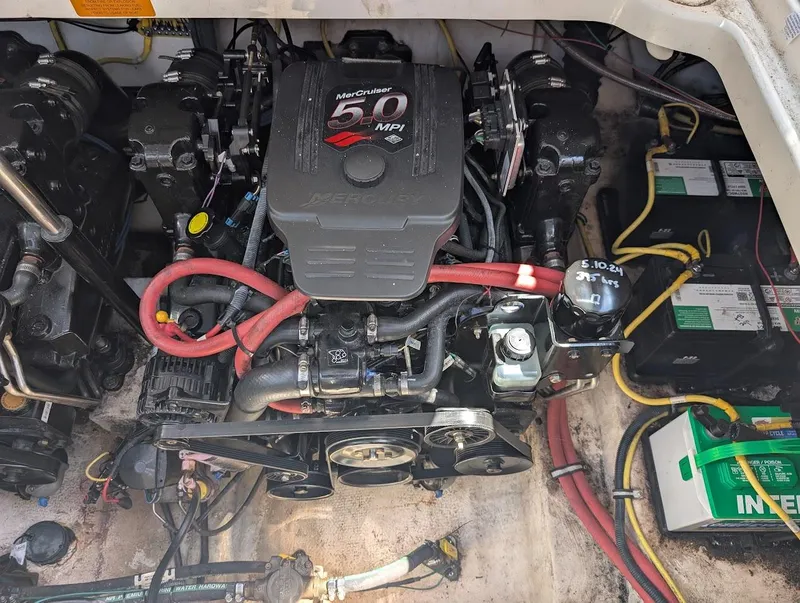 Slide: The Image of Engine compartment of a 2006 Chaparral 310 Signature boat with MerCruiser 5.0 MPI engine. - 36