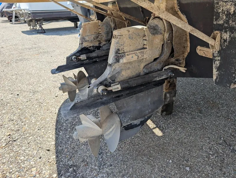 Slide: The Image of Twin propellers of a 2006 Chaparral 310 Signature boat on dry land. - 40