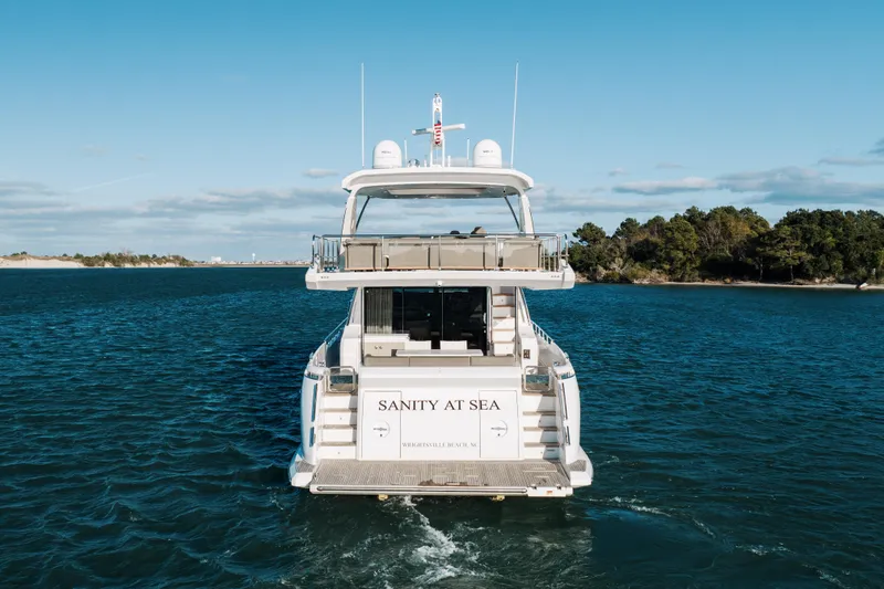 Slide: The Image of Azimut 72 yacht cruising on open water, 2021 model, rear view. - 2