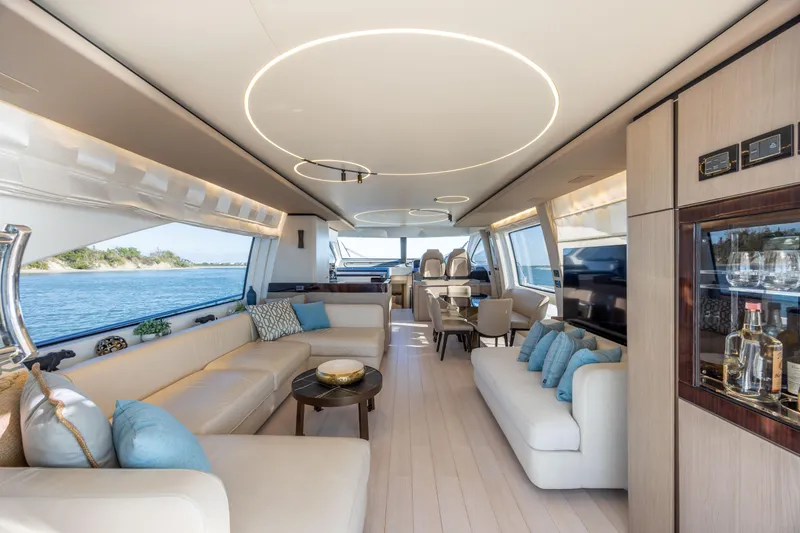 Slide: The Image of Luxurious interior of 2021 Azimut 72 yacht with elegant seating and panoramic windows. - 21
