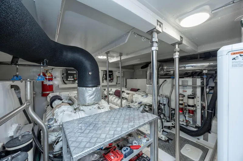Slide: The Image of Engine room of 2021 Azimut 72 yacht, featuring modern equipment and organized layout. - 31