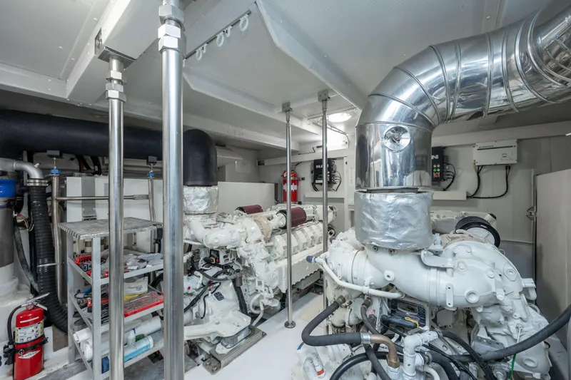 Slide: The Image of Engine room of 2021 Azimut 72 yacht, featuring advanced machinery and ventilation systems. - 32