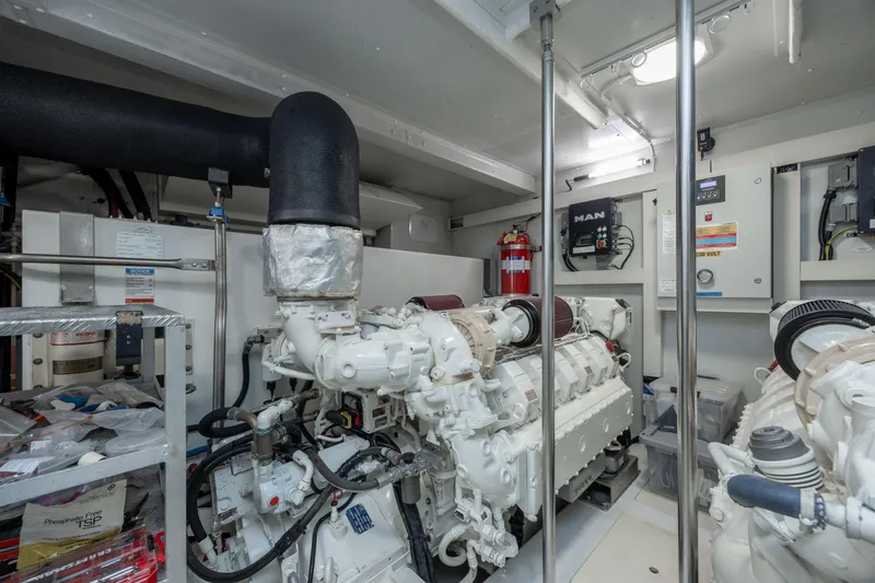Slide: The Image of Engine room of 2021 Azimut 72 yacht, featuring advanced machinery and equipment. - 33