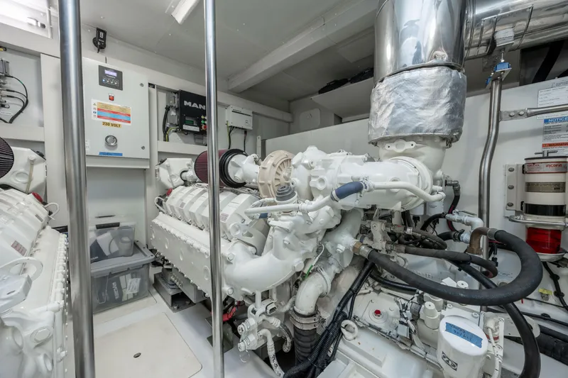 Slide: The Image of Engine room of a 2021 Azimut 72 yacht, showcasing advanced machinery and equipment. - 34