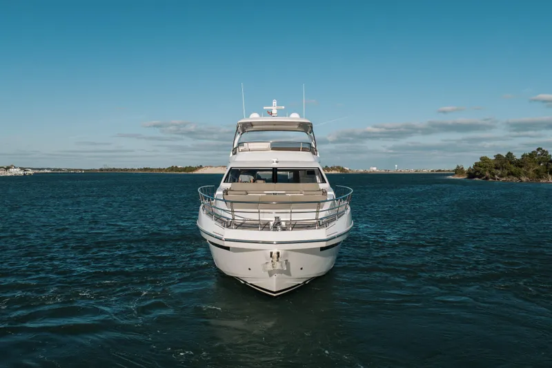 Slide: The Image of Front view of a 2021 Azimut 72 yacht on open water. - 4