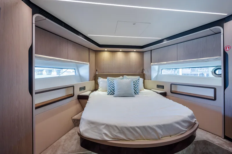 Slide: The Image of Luxurious bedroom interior of 2021 Azimut 72 yacht with modern design and cozy bedding. - 40