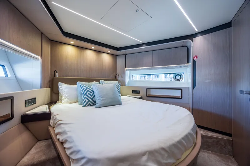 Slide: The Image of Luxurious bedroom interior of 2021 Azimut 72 yacht with modern design and cozy bedding. - 41