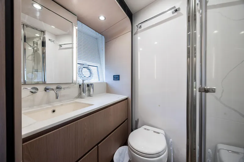 Slide: The Image of Luxurious bathroom in 2021 Azimut 72 yacht with modern fixtures and elegant design. - 43