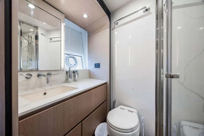 Slide: The Image of Luxury bathroom in 2021 Azimut 72 yacht, featuring modern fixtures and elegant design. - 44