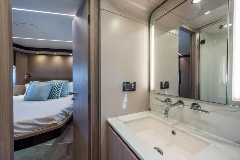 Slide: The Image of Luxurious 2021 Azimut 72 yacht interior with modern bathroom and cozy bedroom. - 47