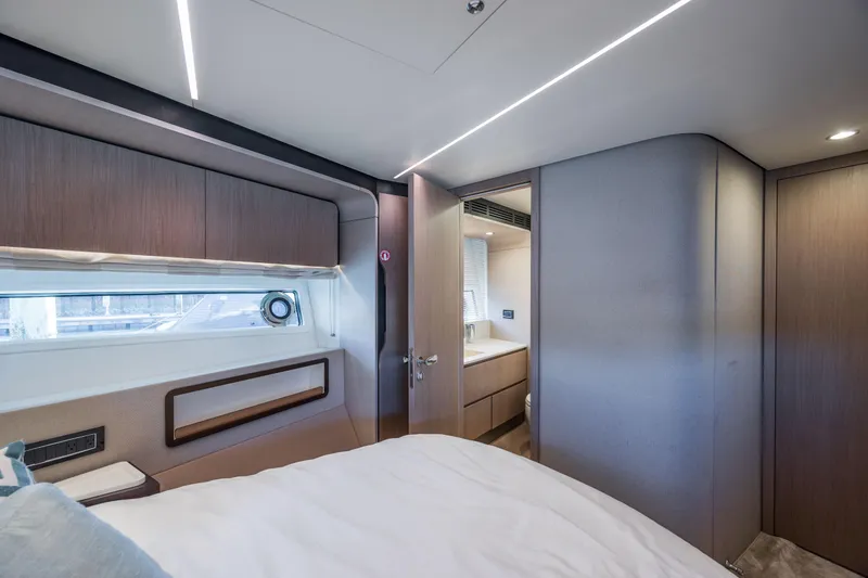 Slide: The Image of Luxurious bedroom interior of 2021 Azimut 72 yacht with modern design and elegant furnishings. - 48