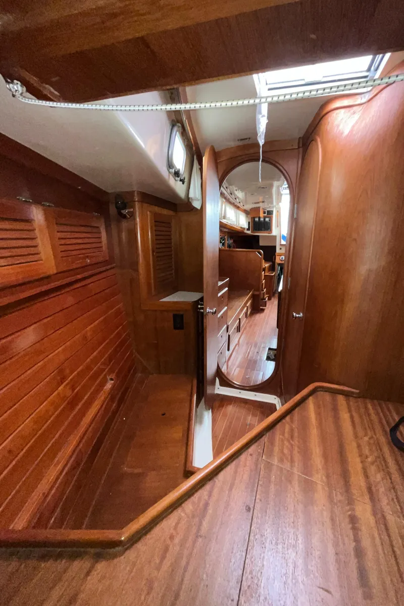 Slide: The Image of 1986 Bristol 38.8 yacht interior with wooden paneling and elegant design. - 31