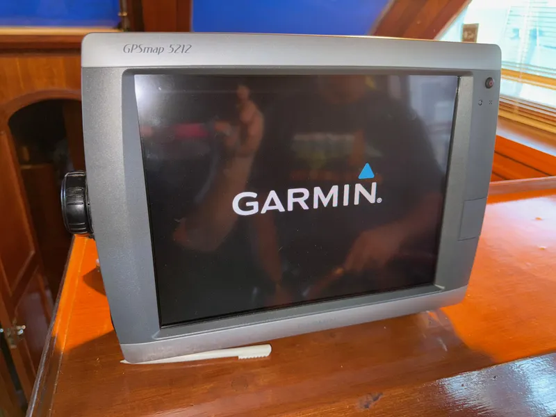 Slide: The Image of Garmin GPSmap 5212 on 1984 Marine Trader Sun Deck yacht interior. - 17