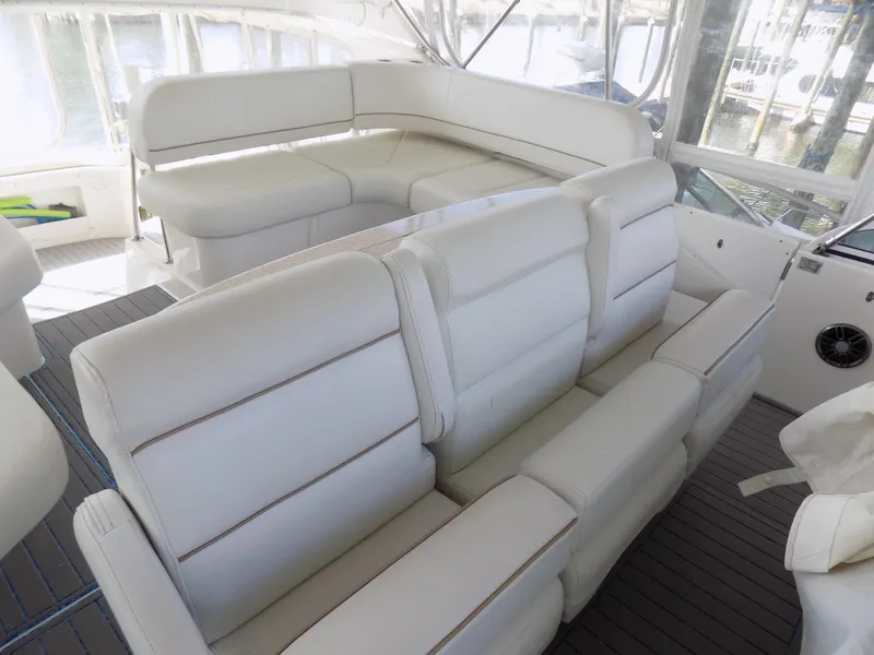Slide: The Image of 2005 Silverton 43 Motor Yacht interior with white leather seating and modern design. - 15