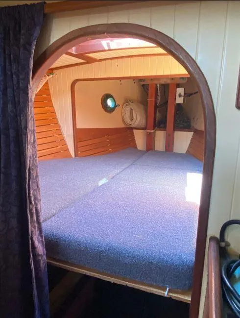 Slide: The Image of Cozy cabin interior of a 1990 Bristol Channel Cutter 28 sailboat. - 14
