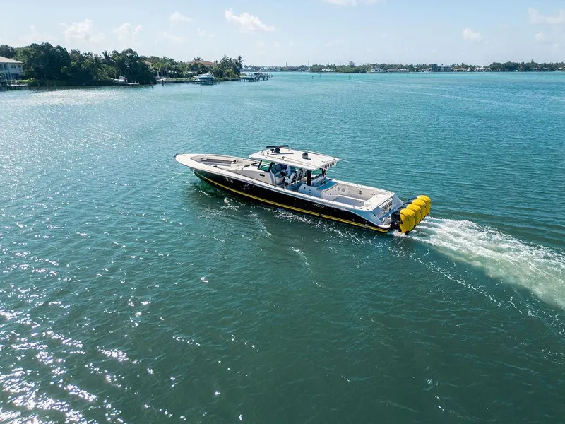 Slide: The Image of 2020 HCB 53 Sueños boat cruising on a sunny day in calm waters. - 10