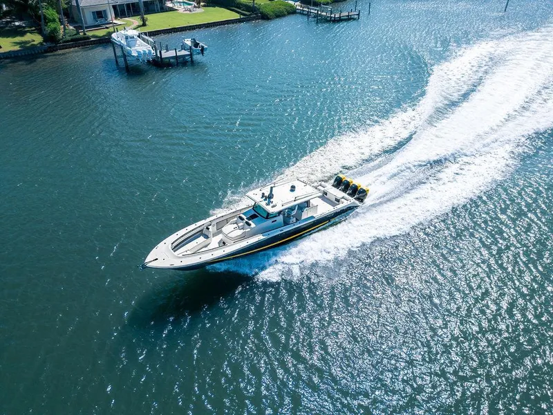 Slide: The Image of Aerial view of 2020 HCB 53 Sueños boat cruising on a sunny waterway. - 47