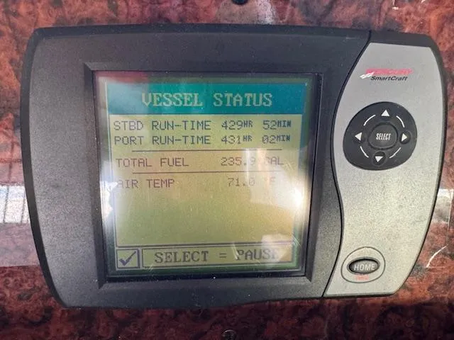 Slide: The Image of 2005 Sea Ray 360 Sundancer vessel status display showing runtime, fuel, and air temperature. - 20