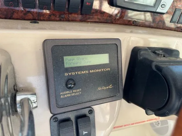 Slide: The Image of 2005 Sea Ray 360 Sundancer systems monitor with audible reset and alarm select. - 22