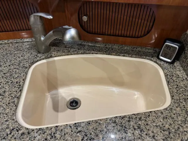 Slide: The Image of Granite countertop with sink and faucet on 2005 Sea Ray 360 Sundancer yacht. - 33