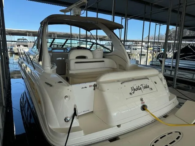 Slide: The Image of 2005 Sea Ray 360 Sundancer yacht docked in marina, rear view. - 4
