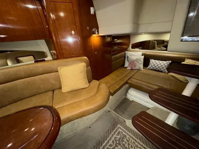 Slide: The Image of Luxurious interior of 2005 Sea Ray 360 Sundancer yacht with plush seating and elegant wood finishes. - 47