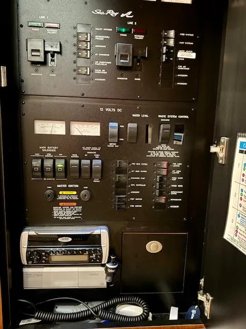 Slide: The Image of Electrical control panel of a 2005 Sea Ray 360 Sundancer boat. - 49
