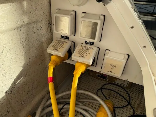 Slide: The Image of Shore power connections on a 2005 Sea Ray 360 Sundancer boat. - 8