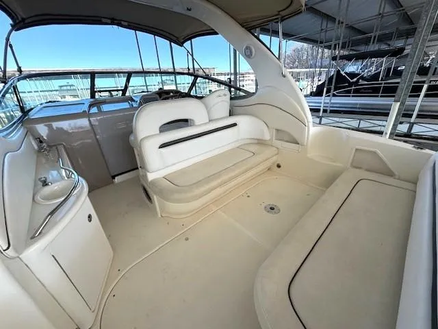 Slide: The Image of 2005 Sea Ray 360 Sundancer yacht interior with spacious seating and elegant design. - 9