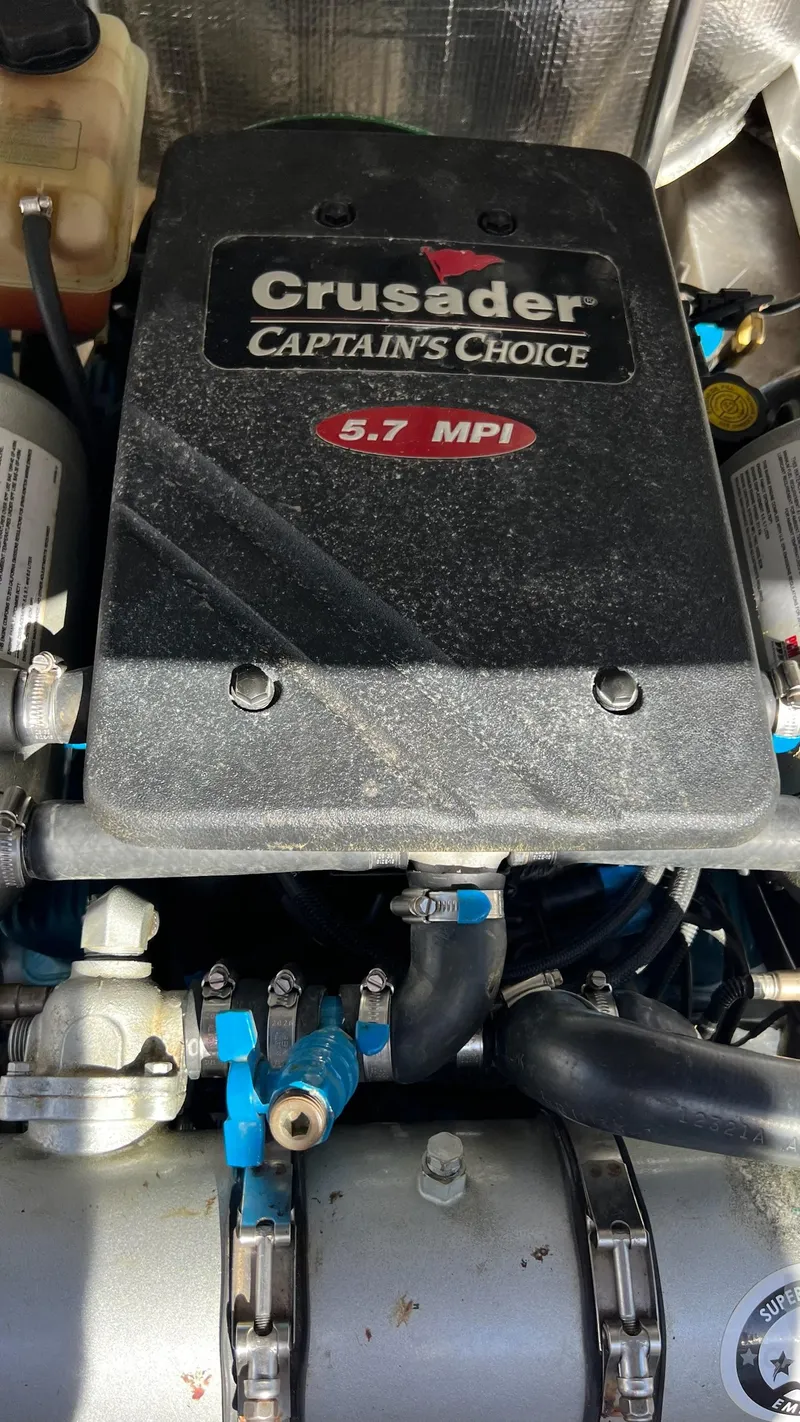 Slide: The Image of Crusader Captain's Choice 5.7 MPI engine in 2013 Vanquish 24 Runabout boat. - 11