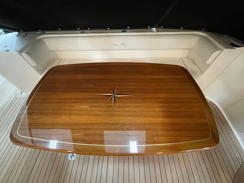 Slide: The Image of Luxurious wooden table on 2009 Sea Ray 580 Sedan Bridge yacht deck. - 20